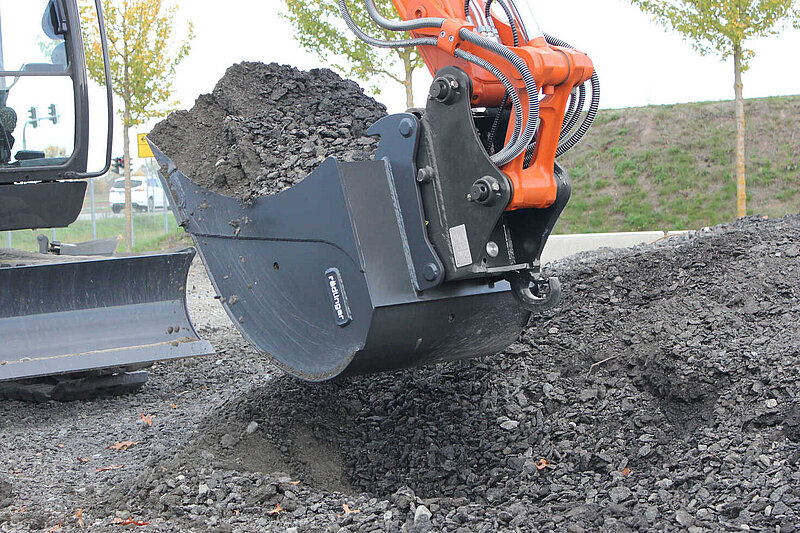 Filled Standard Backhoe Bucket (6 to 12 t) by Rädlinger