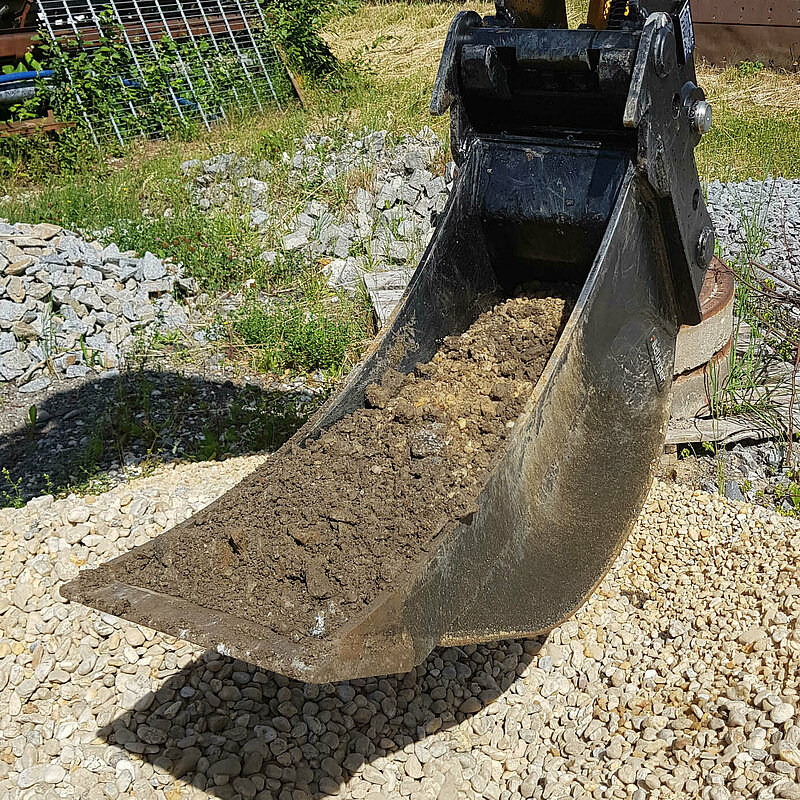 Close-up of a Standard Backhoe Bucket without Teeth (6 to 12 t) by Rädlinger