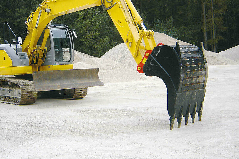 Stone Placing Bucket by Rädlinger mounted to a crawler excavator