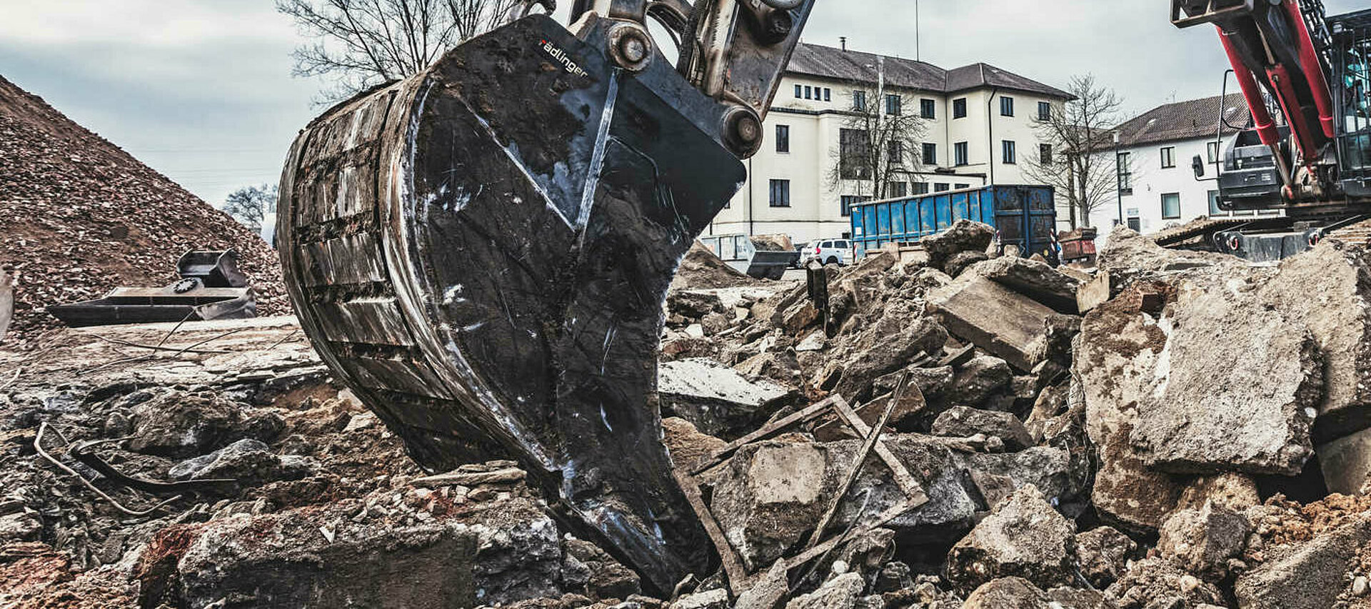 Excavator bucket in use on a demolition excavator